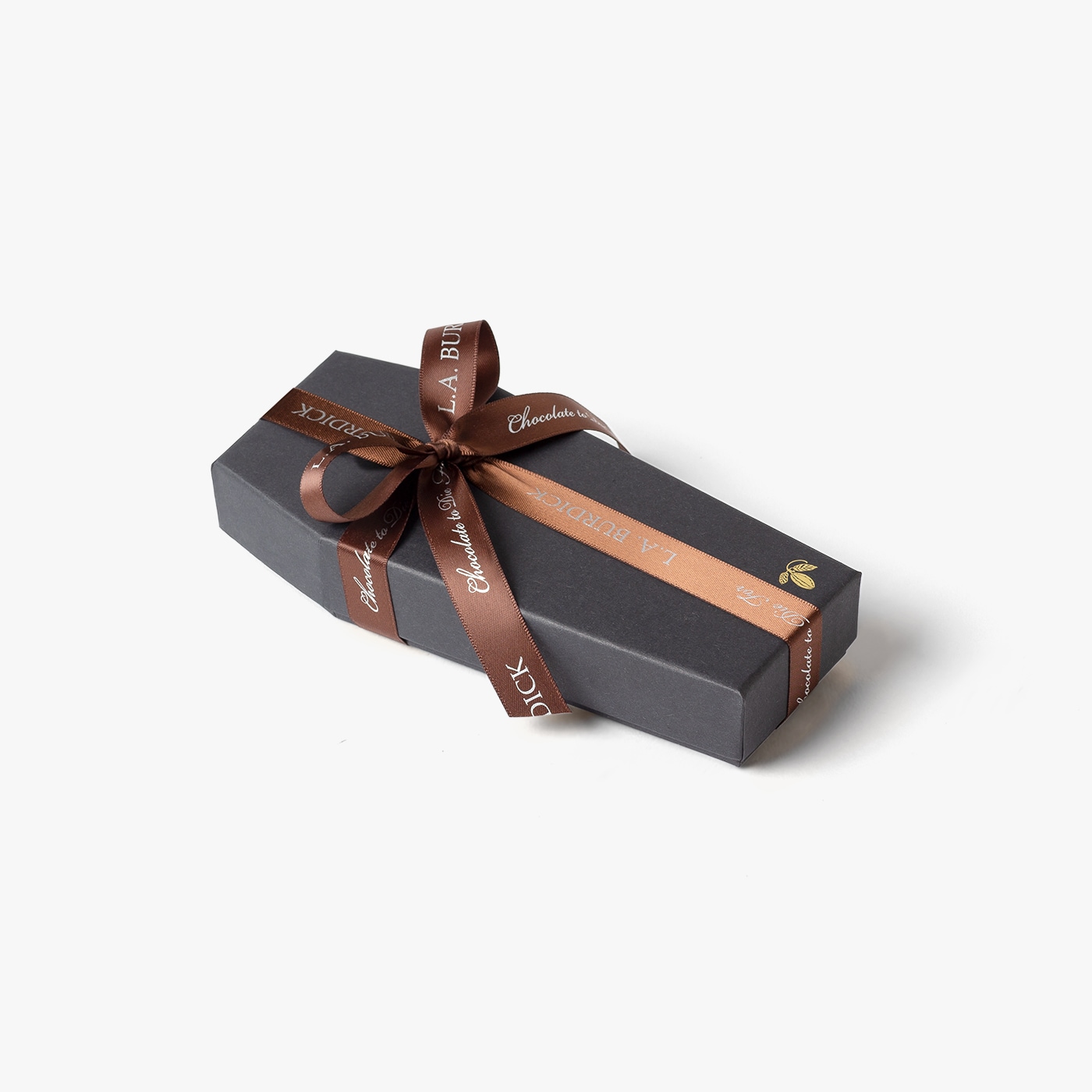 Signature coffin packaging tied with a bow and ready to celebrate Halloween